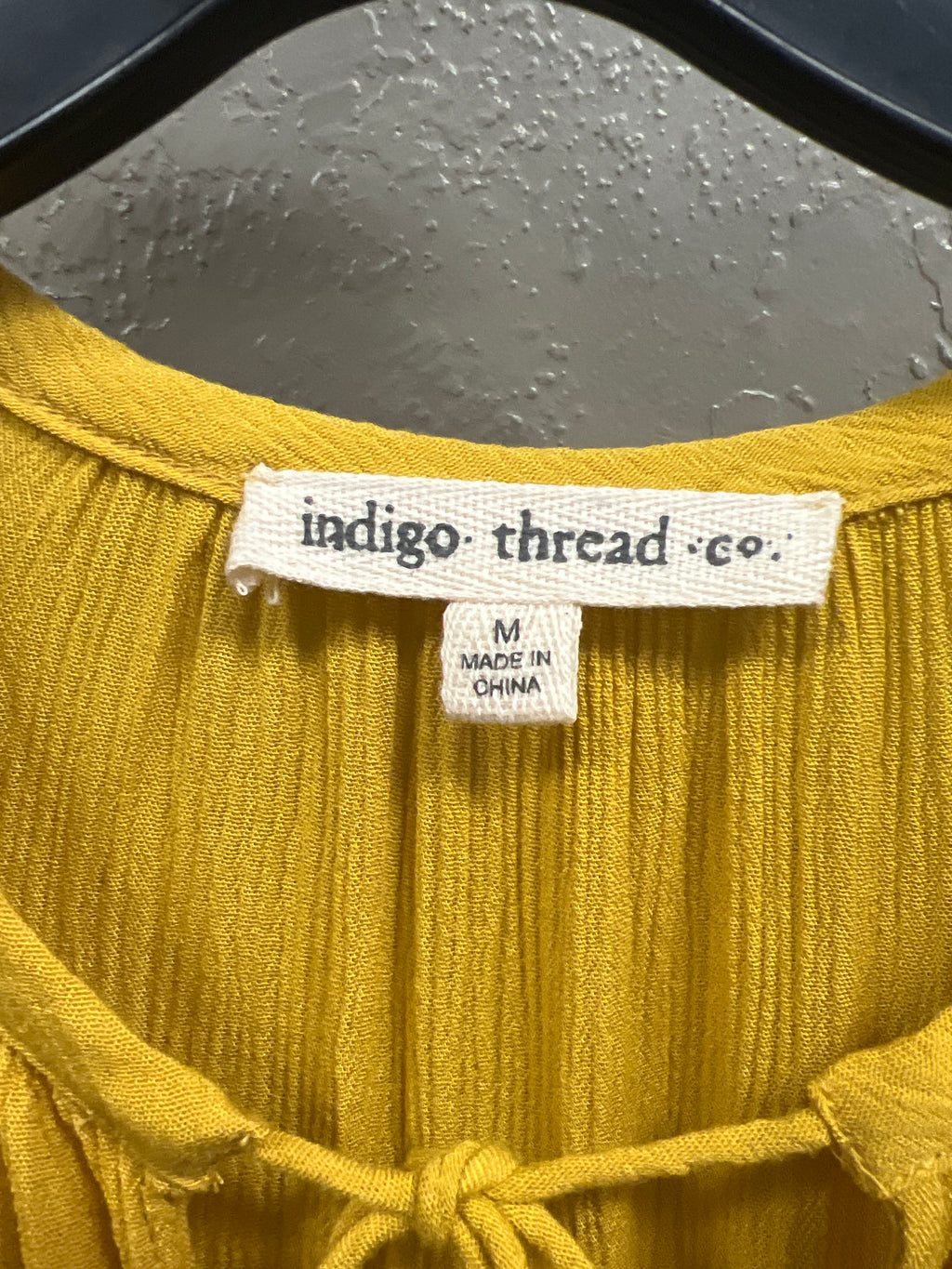 NWOT INDIGO THREAD TIERED TOP