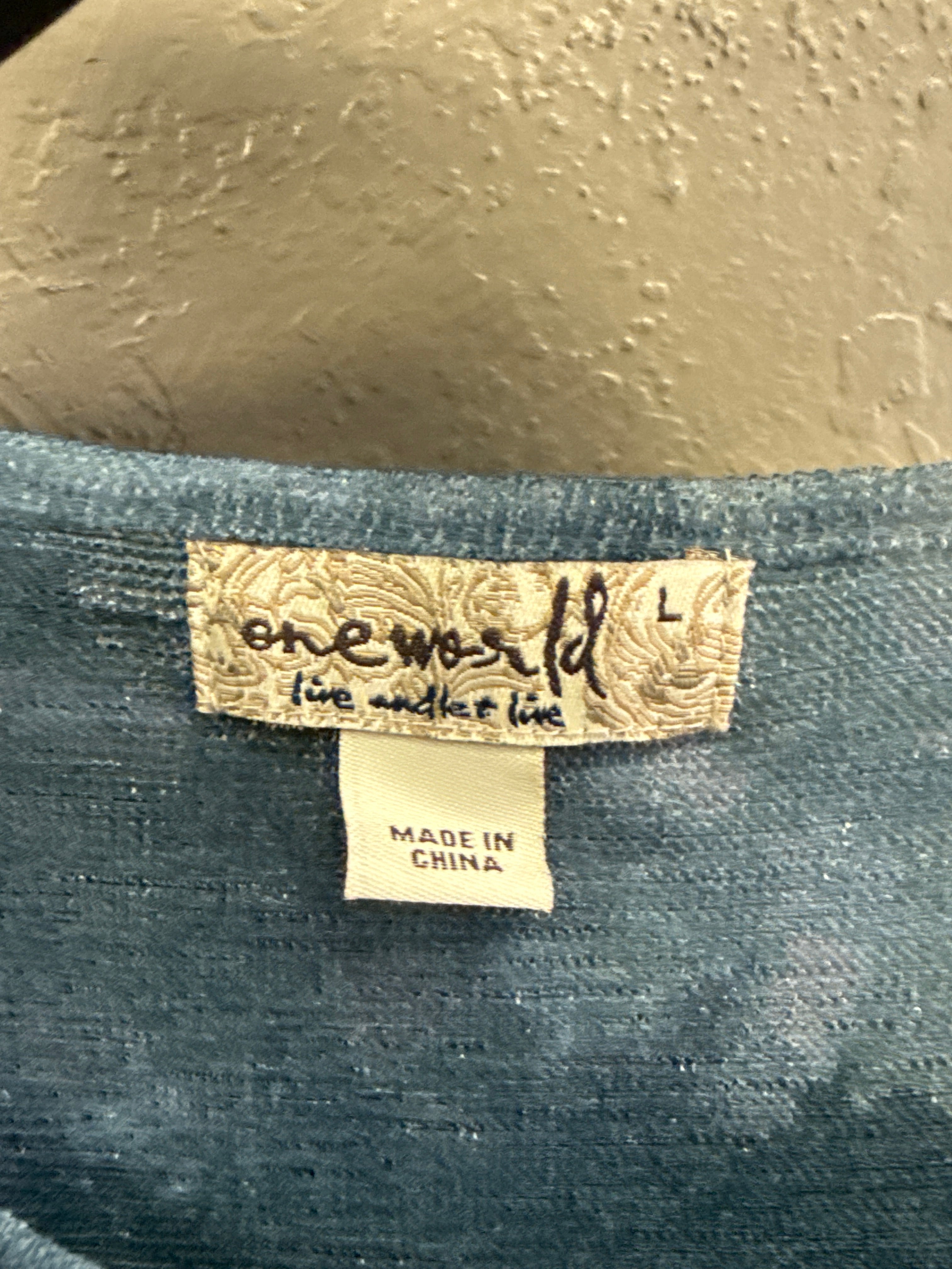 NWT One World Asym Top (org$48)