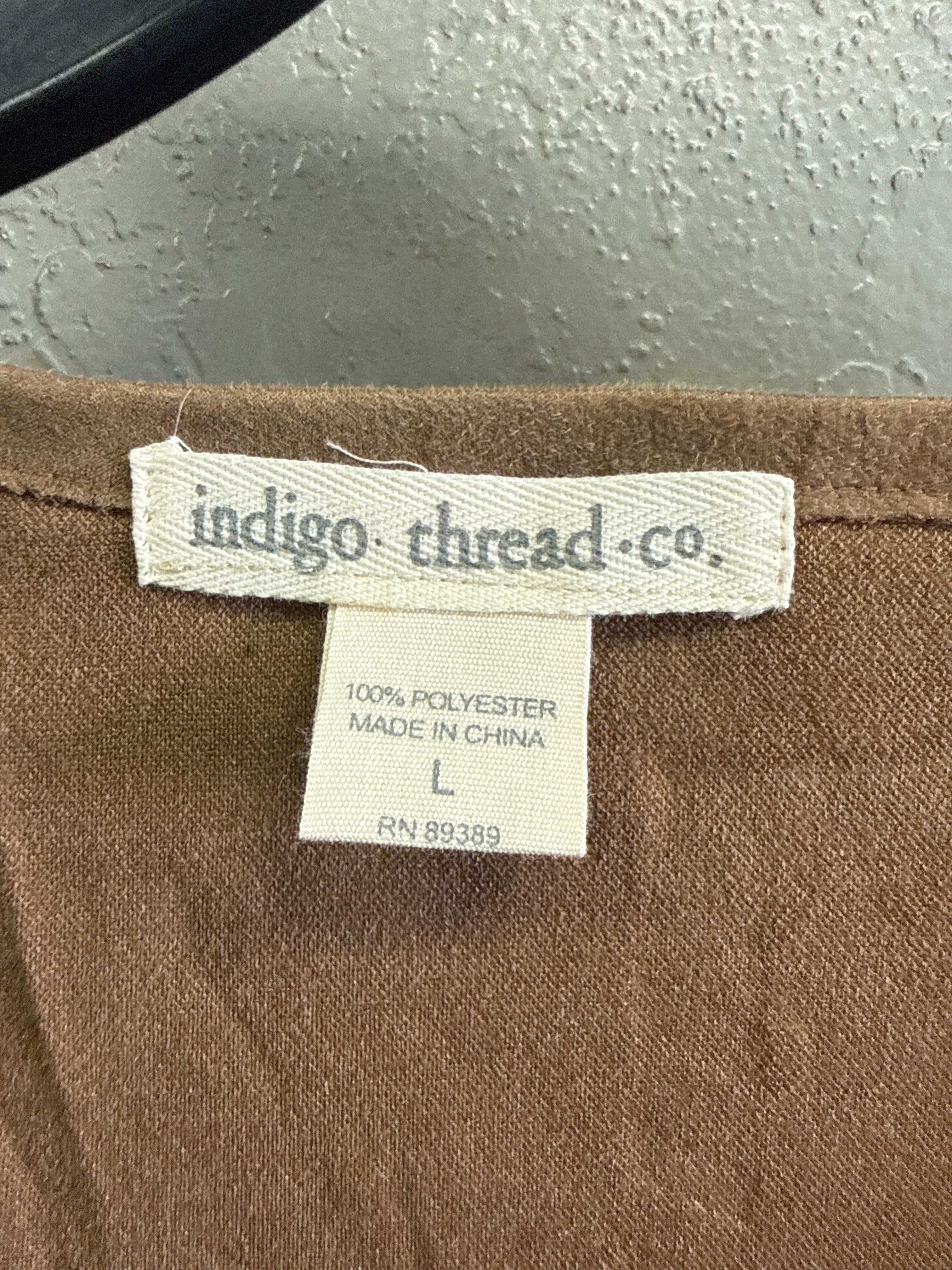 NWOT Indigo Thread Laser-Cut Fringe Vest